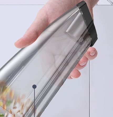 VC036S Transparent detachable dust cup being emptied