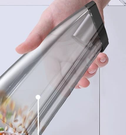 VC038S Transparent detachable dust cup being emptied