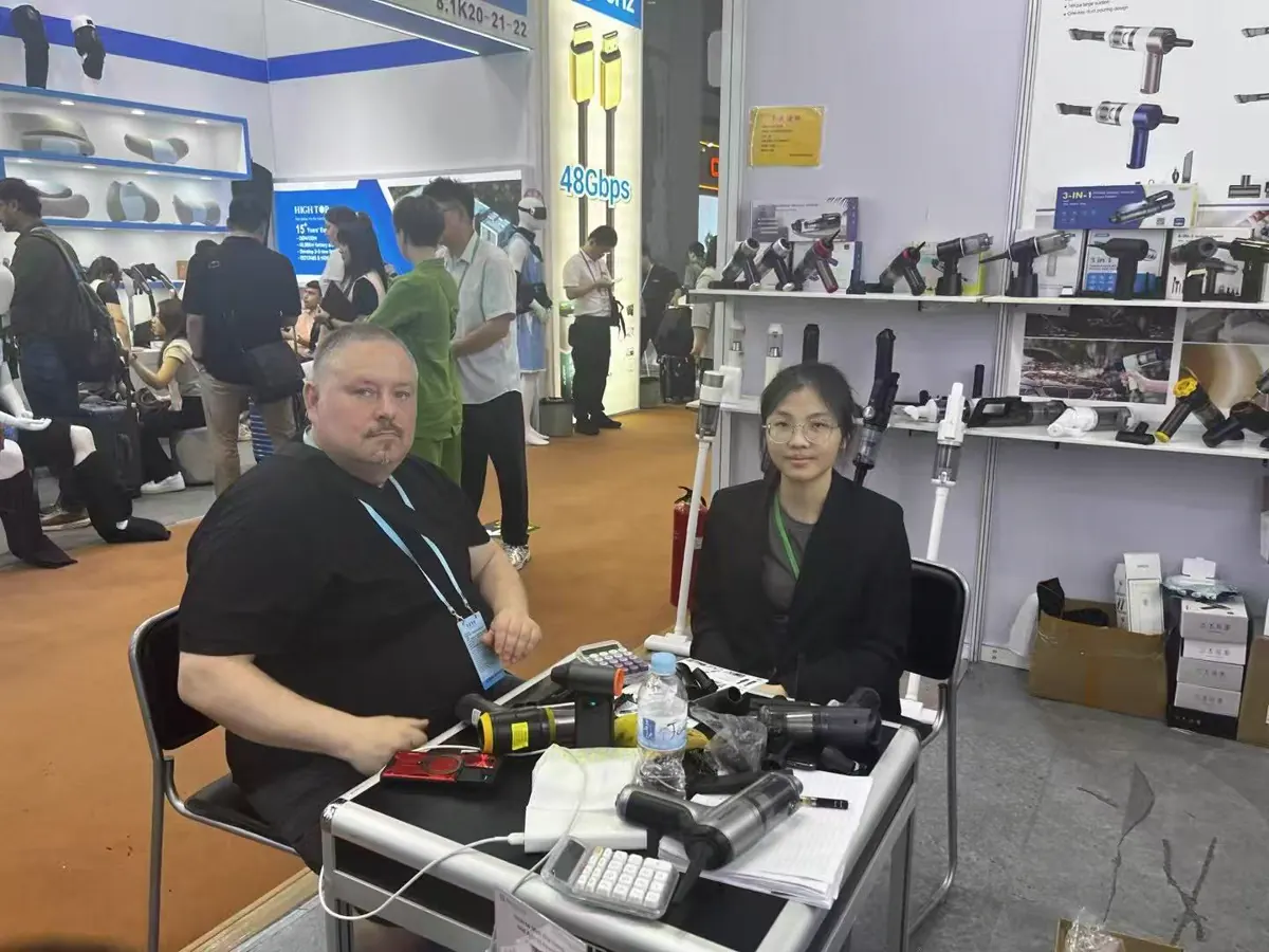 Customer consultation with the DRC team at the trade show booth